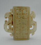 A Chinese jade pendant. 4.5 cm high.