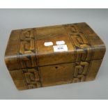 A Victorian inlaid walnut sewing box. 28 cm wide.