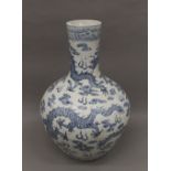 A Chinese porcelain blue and white vase. 59 cm high.