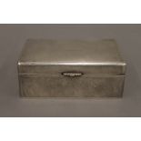 A Chinese silver cigarette box. 15.5 cm wide. 19.1 troy ounces total weight.