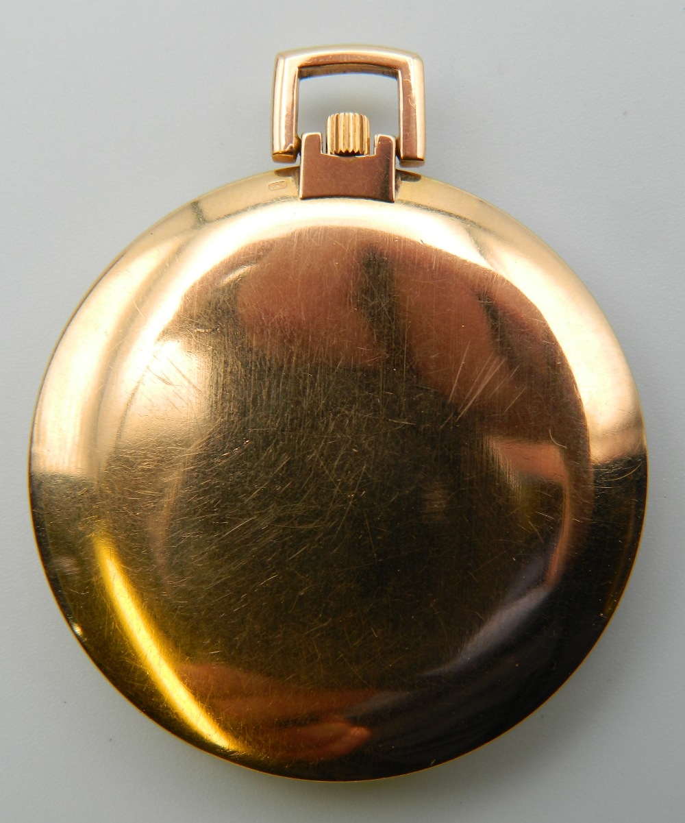 An 18 ct gold ultra slim pocket watch, by Universal Geneve. 4 cm diameter. - Image 2 of 2