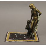 A cold painted bronze model of a girl and leopard. 16 cm high.