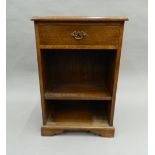 A modern oak side cabinet. 71 cm high.