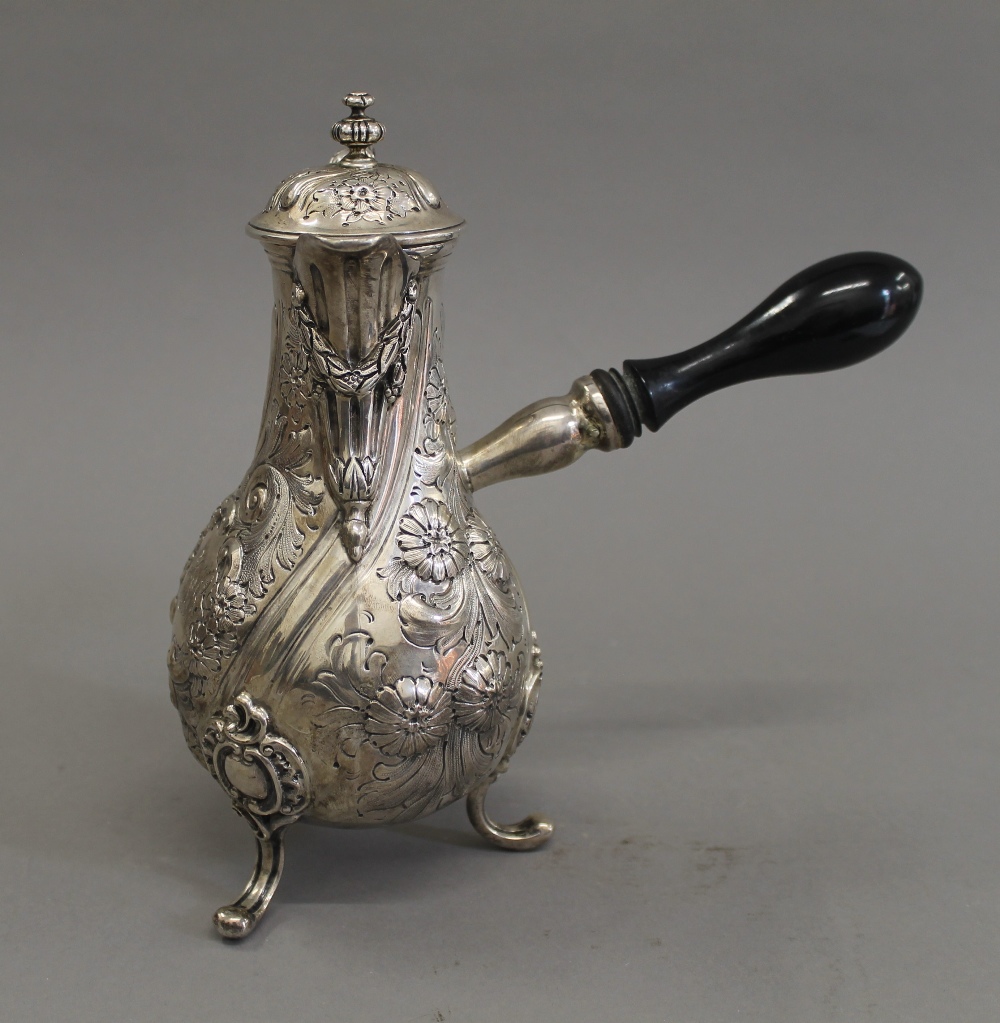 A silver embossed chocolate pot. 21 cm high. 19.6 troy ounces total weight. - Image 2 of 8