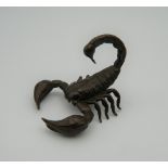 A small bronze model of a scorpion. 4.5 cm wide.