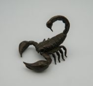 A small bronze model of a scorpion. 4.5 cm wide.