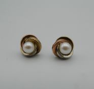 A pair of 9 ct tri-colour gold and pearl earrings. 8 cm diameter.