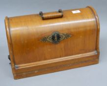 A Victorian cased Singer sewing machine