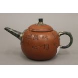 A Chinese Ying Xing and jade teapot. 18 cm long.