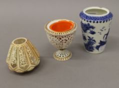 An 18th century Worcester tea caddy and two small pieces of Royal Worcester. The former 11 cm high.