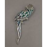 A silver plique-a-jour brooch formed as a parrot. 7 cm wide.