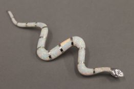 A silver opal snake pendant. 12 cm high.