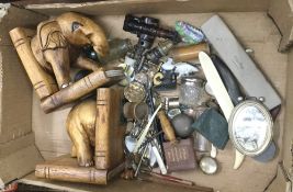 A quantity of miscellaneous items, including corkscrews, vintage buttons, bookends, etc.