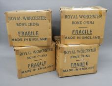 A large quantity of boxed Royal Worcester dinner wares, comprising: 16 cups, 16 saucers,