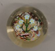 A vintage glass paperweight. 7.5 cm high.