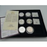 A quantity of silver proof coins, etc.