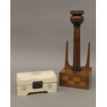 A bone trinket box and a wooden lamp stand. The latter 32 cm high.