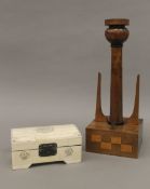 A bone trinket box and a wooden lamp stand. The latter 32 cm high.