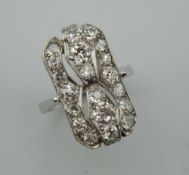 An Art Deco 18 ct white gold diamond ring. Ring size O/P.