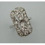 An Art Deco 18 ct white gold diamond ring. Ring size O/P.