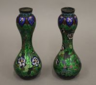 A pair of green ground cloisonne vases. 18 cm high.