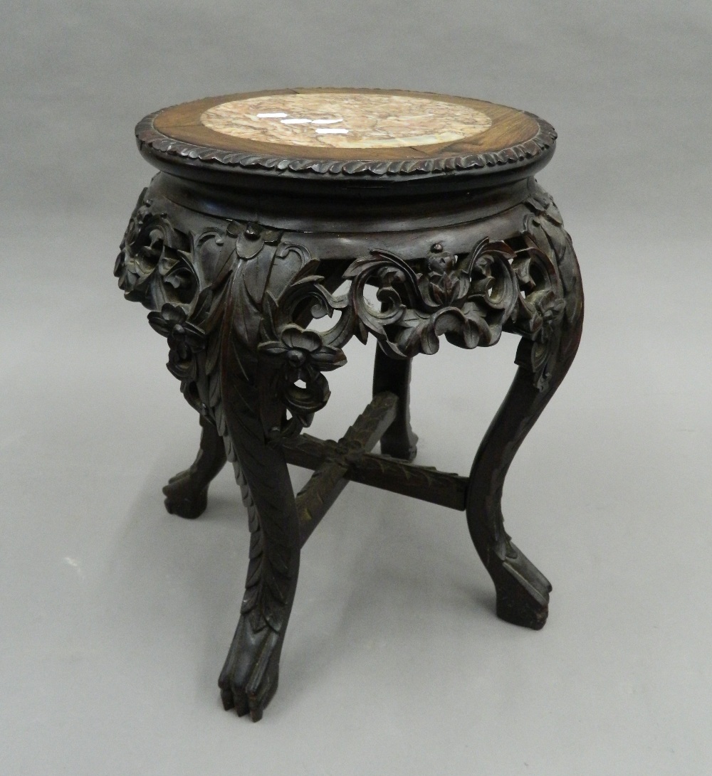 A Chinese marble topped stand. 49 cm high.