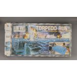 A boxed Torpedo Run game. 87.5 cm wide.