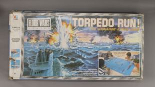 A boxed Torpedo Run game. 87.5 cm wide.