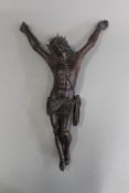 An 18th/19th century Continental carved wooden model of Christ. 38.5 cm high.