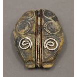 A Celtic style brooch, in original box. 5 cm high.