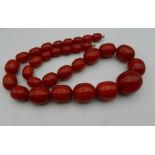 A string of large vintage amber beads. 67 cm long.