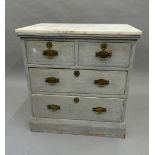 A blue painted marble topped chest of drawers. 76 cm wide.