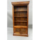A large modern hardwood bookcase with cupboard base. 205 cm high x 100 cm wide.