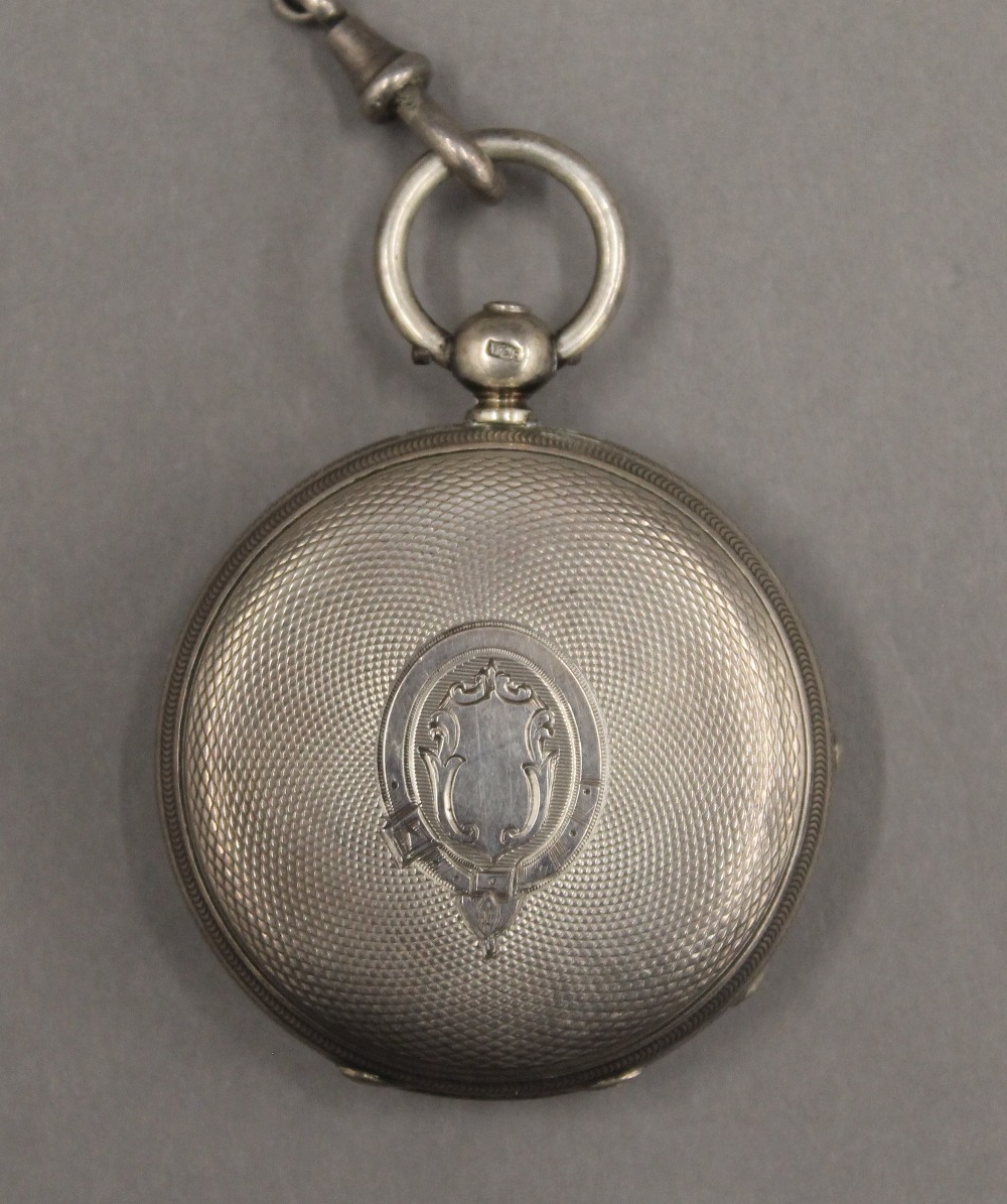 Two 19th century silver pocket watches on chains and a brass pocket watch case. - Image 11 of 12