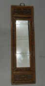 A Chinese framed mirror. 120.5 cm high.