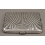 A Danish silver plated sunburst cigarette case. 8 cm wide. 62.8 grammes.