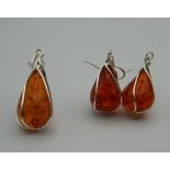 A pair of dress earrings, together with matching pendant. The latter 4 cm high.
