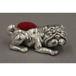 A silver pin cushion in the form of a bulldog. 4.5 cm long.