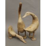 Three wooden ducks. The largest 43 cm high.