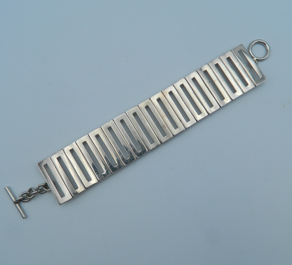 A 1960s silver bracelet. 14.5 cm long. 53.6 grammes.