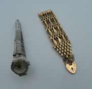 A 9 ct gold gate bracelet and a watch