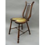 A Victorian lyre back music chair. 35.5 cm wide.