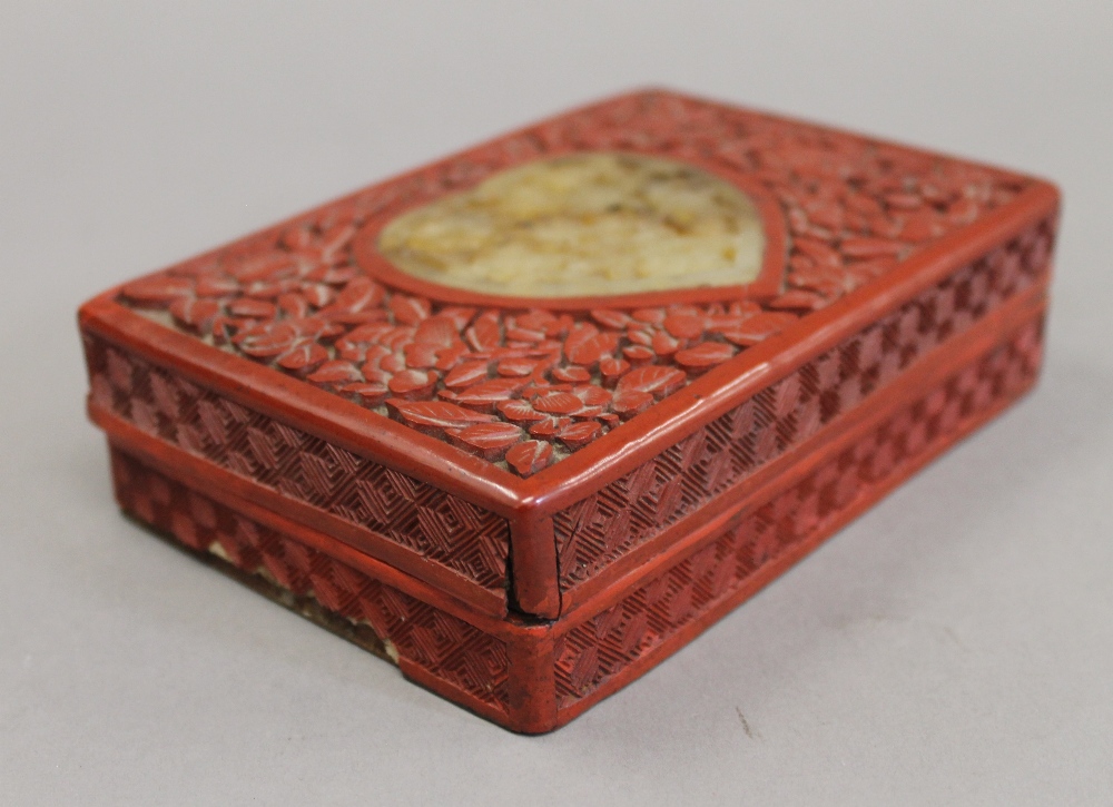 A cinnabar and jade box. 14.5 cm wide. - Image 2 of 7