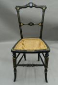 A single gilded cane seated chair inset with a classical Jasperware roundel. 38 cm wide.