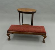 An Edwardian inlaid mahogany side table and a foot stool. The latter 102 cm long.