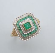 A 9 ct gold Art Deco style emerald and diamond ring. Ring size Q/R.