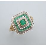 A 9 ct gold Art Deco style emerald and diamond ring. Ring size Q/R.