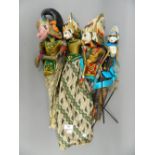 Four Eastern vintage Shinto stick puppets. The largest 58 cm high.