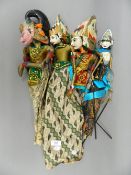 Four Eastern vintage Shinto stick puppets. The largest 58 cm high.