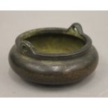 A Chinese bronze censer. 11.5 cm diameter.